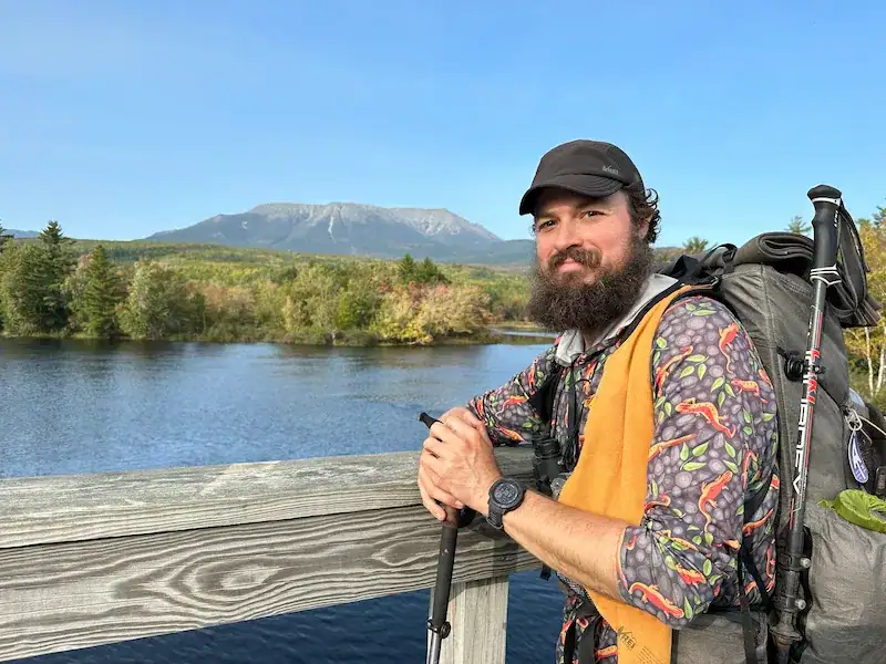 James Burney with Katahdin in the background, at the end of his Appalachian Trail thru-hike